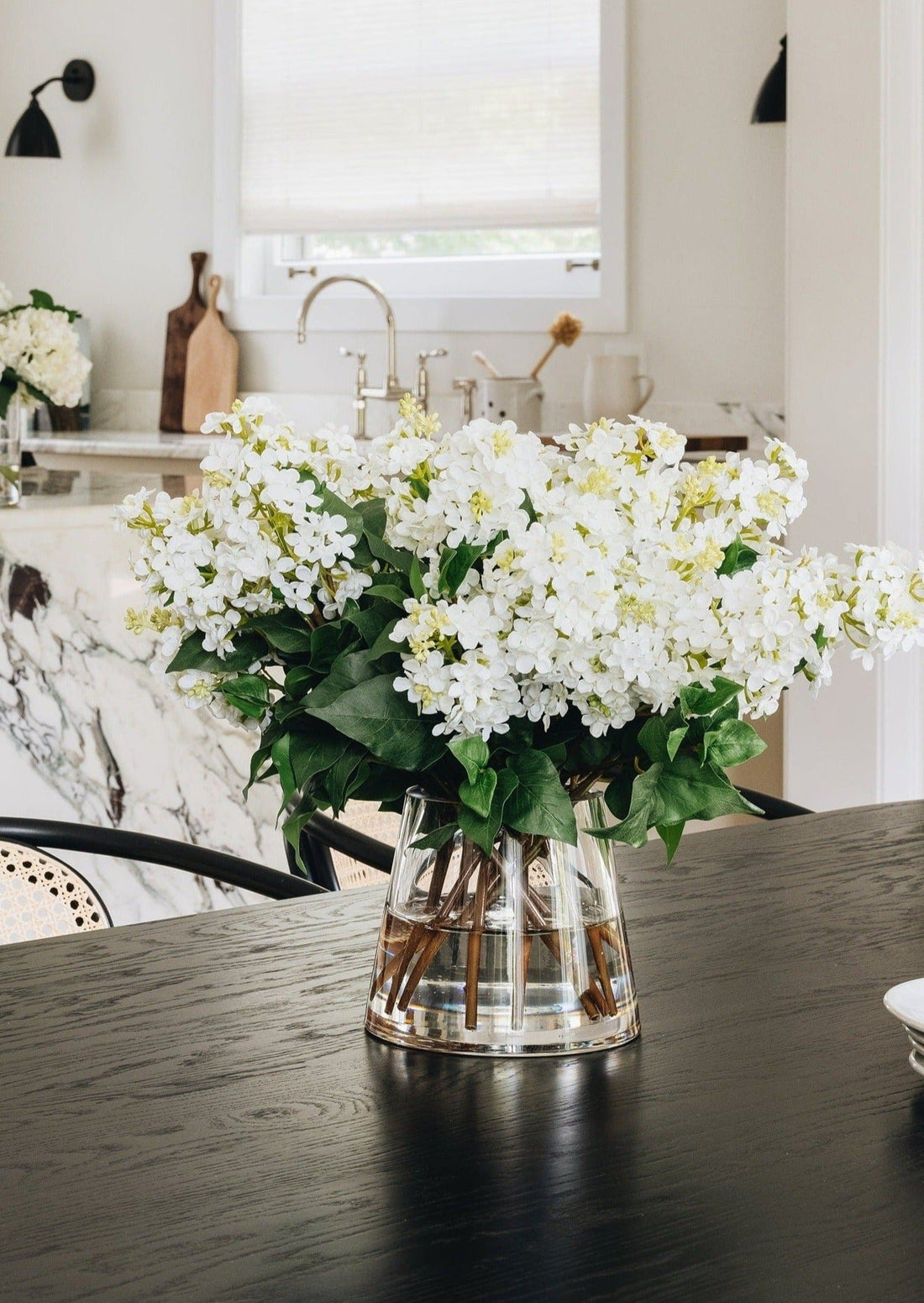 Faux Flower Arrangement of White Lilacs in Glass Vase at afloral