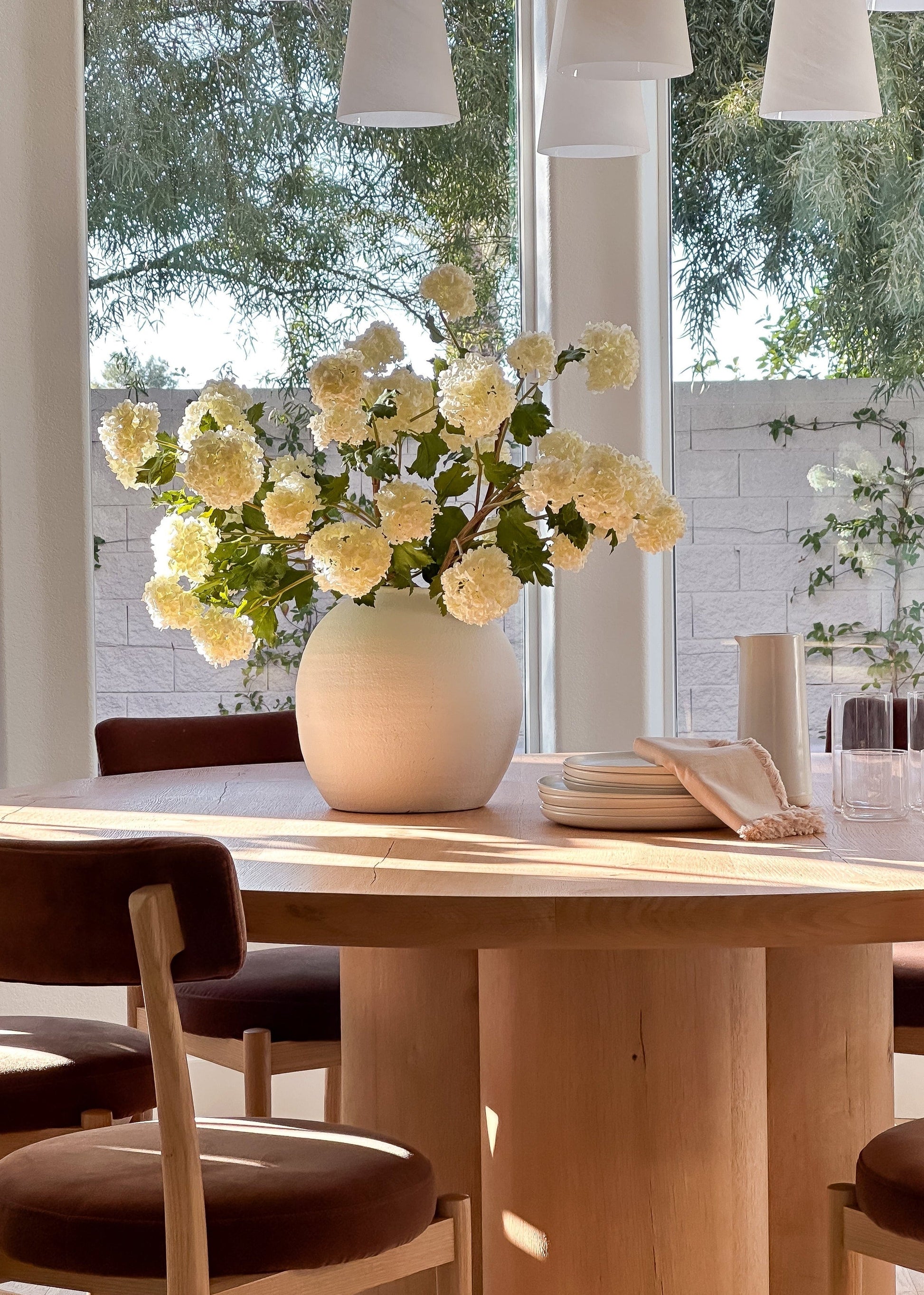 white flowers in white vase