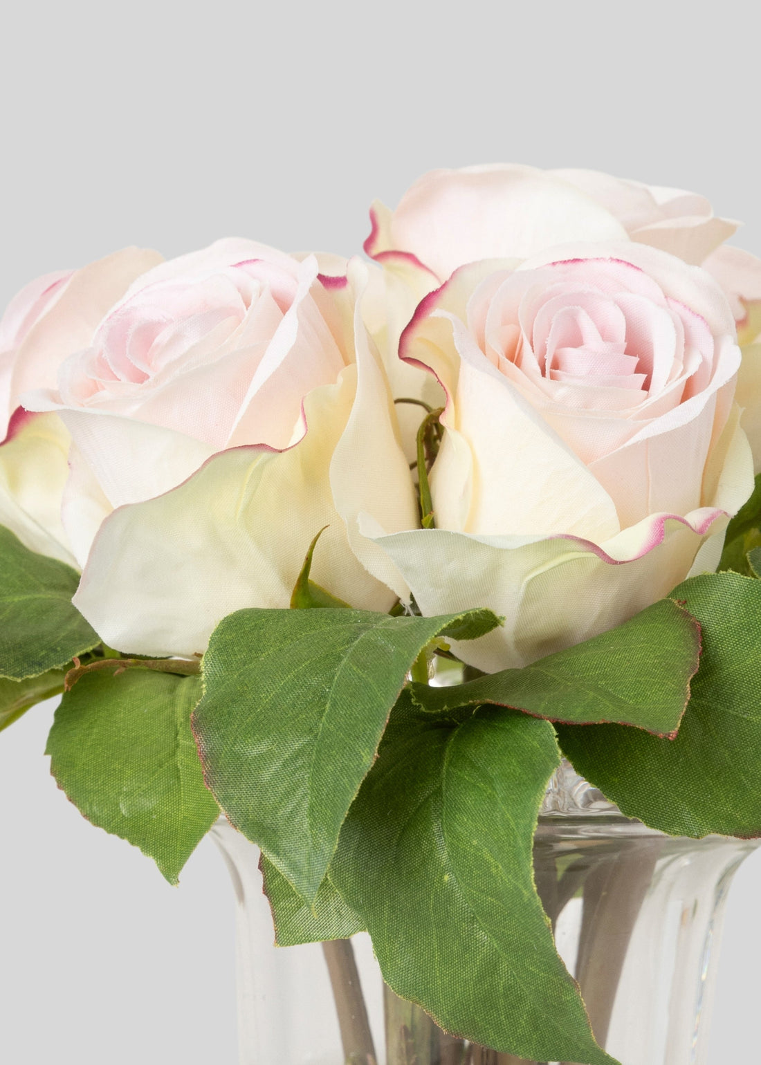 Artificial Soft Pink Roses in a Glass Vase