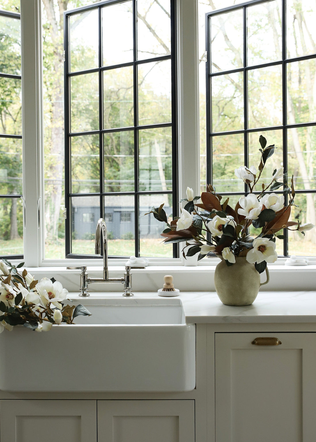 Faux Spring Flowers Magnolia Branch in Cream at Afloral